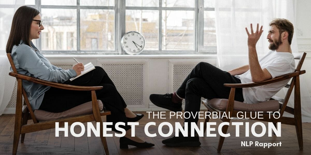 Two People Sitting Across From One Another In Rapport