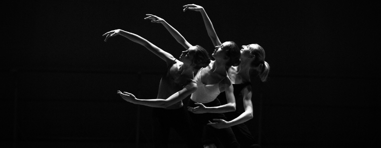 Three Female Ballet Dancers Synchronized