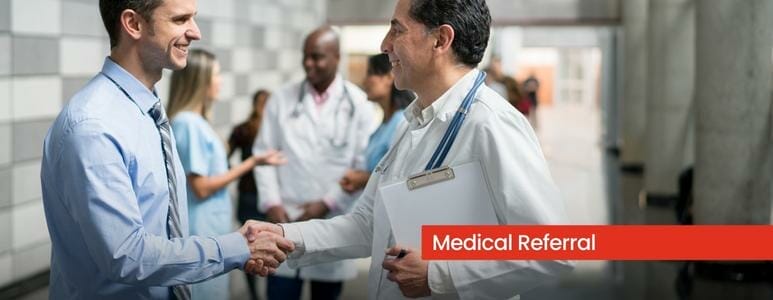 Doctor And Patient Shaking Hands