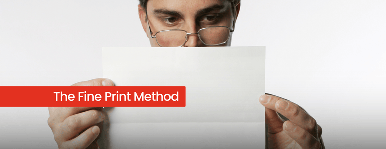 Man With Glasses Reading A Piece Of Paper