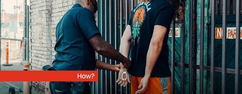 Police Officer Handcuffing Suspect