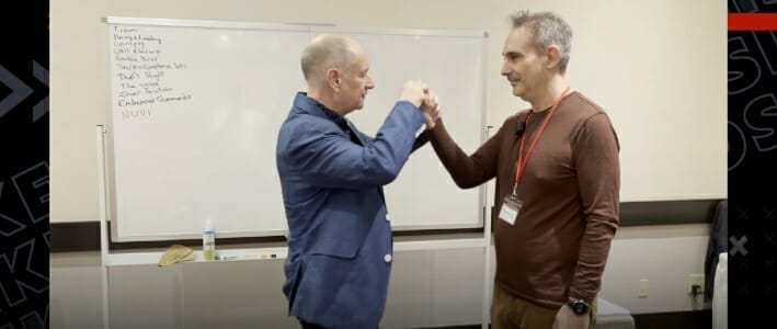 Mike Mandel Hypnotizing A Man In A Classroom